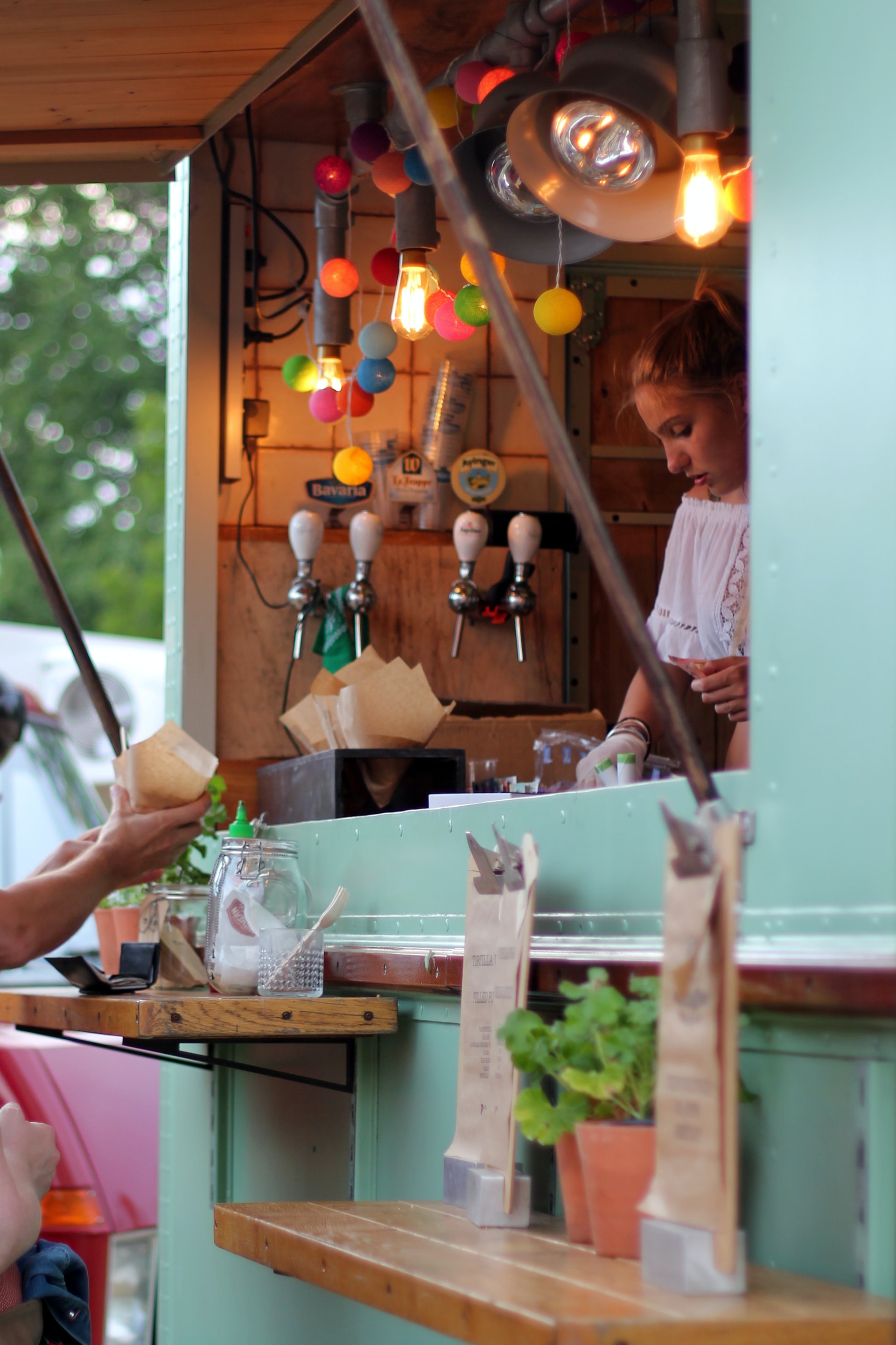 Food truck fulfilling an order.